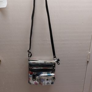 Black and pearl crossbody purse.